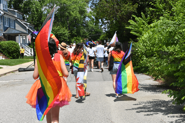 carrying pride flags